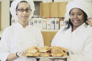Sha'kiyla Davis (left) Sharmel Williams (right). Both are students in the Culinary Arts program offered by the EOC.