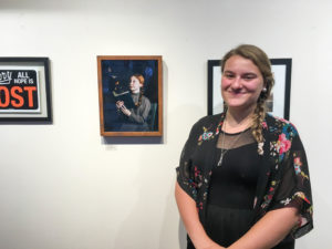D'Amico poses with her work titled "Anne with an e." 